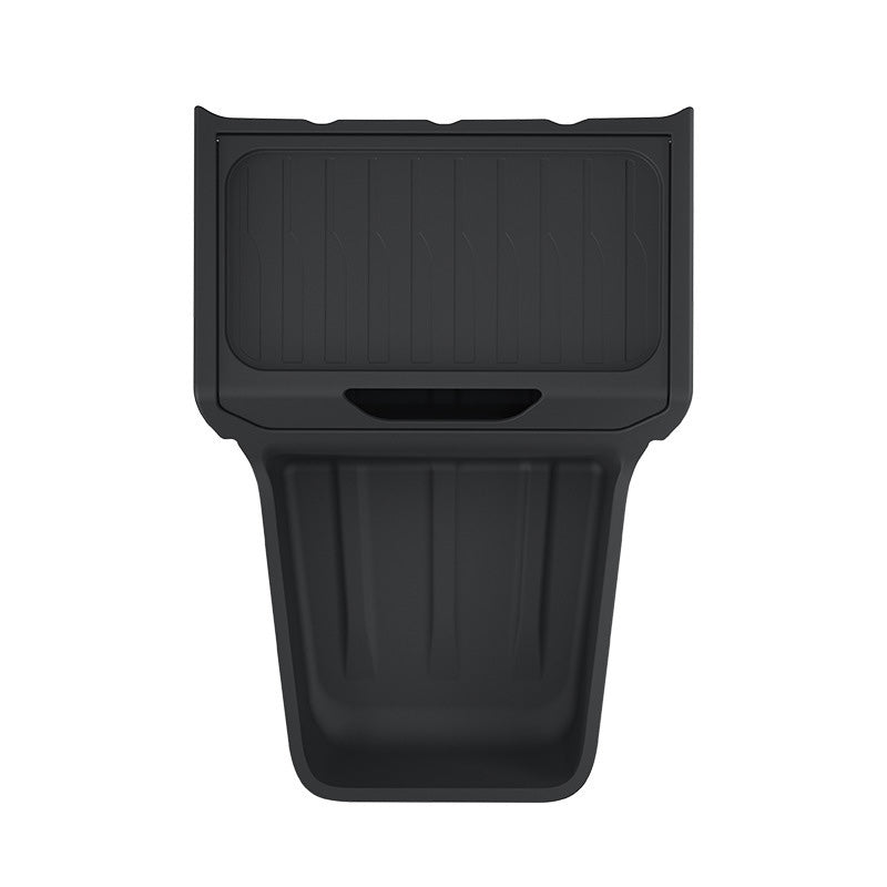 Black center console organizer tray laid flat on a plain white background to show its compartments.