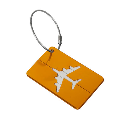 Orange aluminum luggage tag with a steel cable loop, angled on a white background ready to label a suitcase.