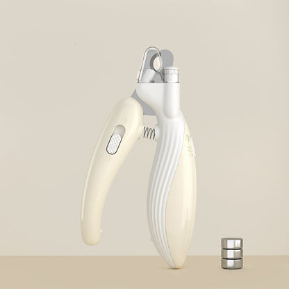White and cream LED pet nail clippers standing upright on a plain beige surface.