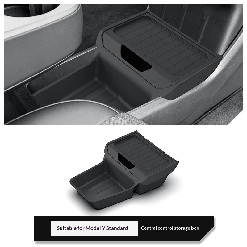 Black plastic storage box fitted into a car's center console to organize everyday items; car interior not included.
