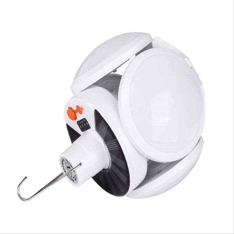 Compact white and black collapsible LED lantern shown upright against a plain white background.