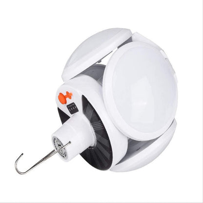 Compact white and black collapsible LED lantern shown upright against a plain white background.