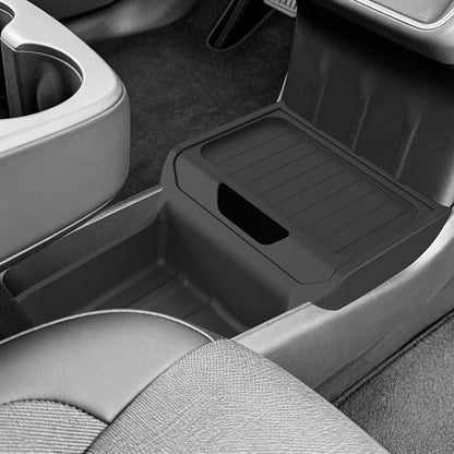 Black center console organizer tray fitted into a car console to keep small items tidy; car interior not included.