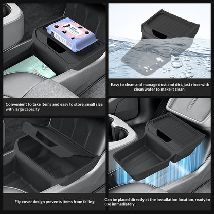 Black silicone center console tray holding small items in a car and shown being rinsed; car interior not included.