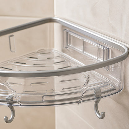 Close-up of the corner shelf's clear tray edge, grey trim, adhesive wall mount and hooks