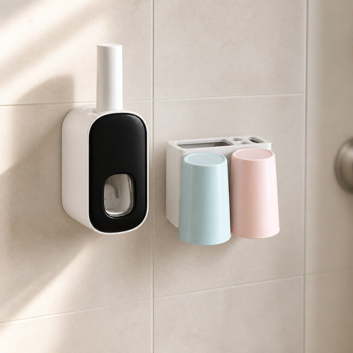Toothbrush holder with a white housing and glossy black faceplate mounted on a tiled bathroom wall